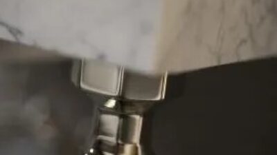 View under marble bathroom vanity counter