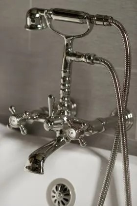 Closeup of bathrub faucet