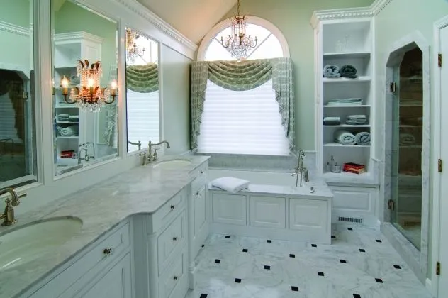 White bathroom with white and black tile
