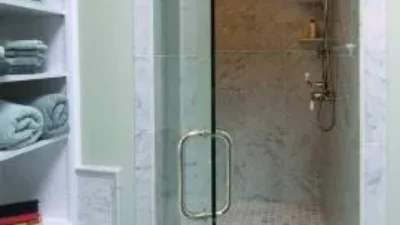 Carlisle Traditional Bathroom shower with open glass door