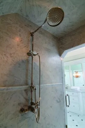 Carlisle Traditional Bathroom shower head and fittings