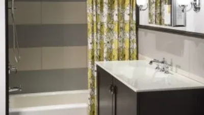 Inspirations Studio bathroom demo with wood vanity