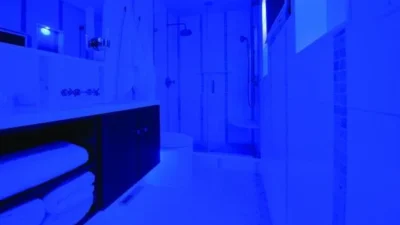 bathrrom with blue ceiling lights